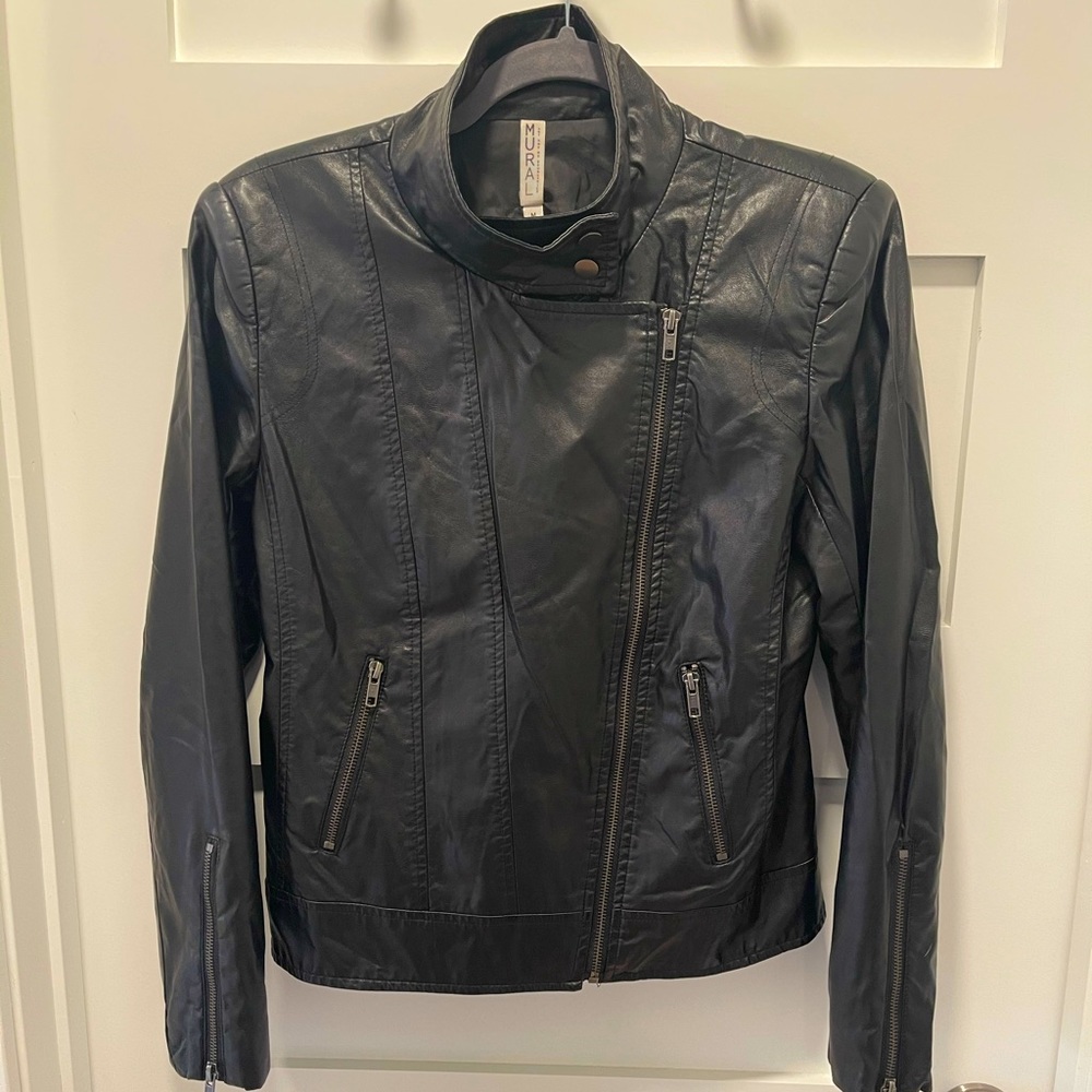 Cute biker jacket. Great condition.